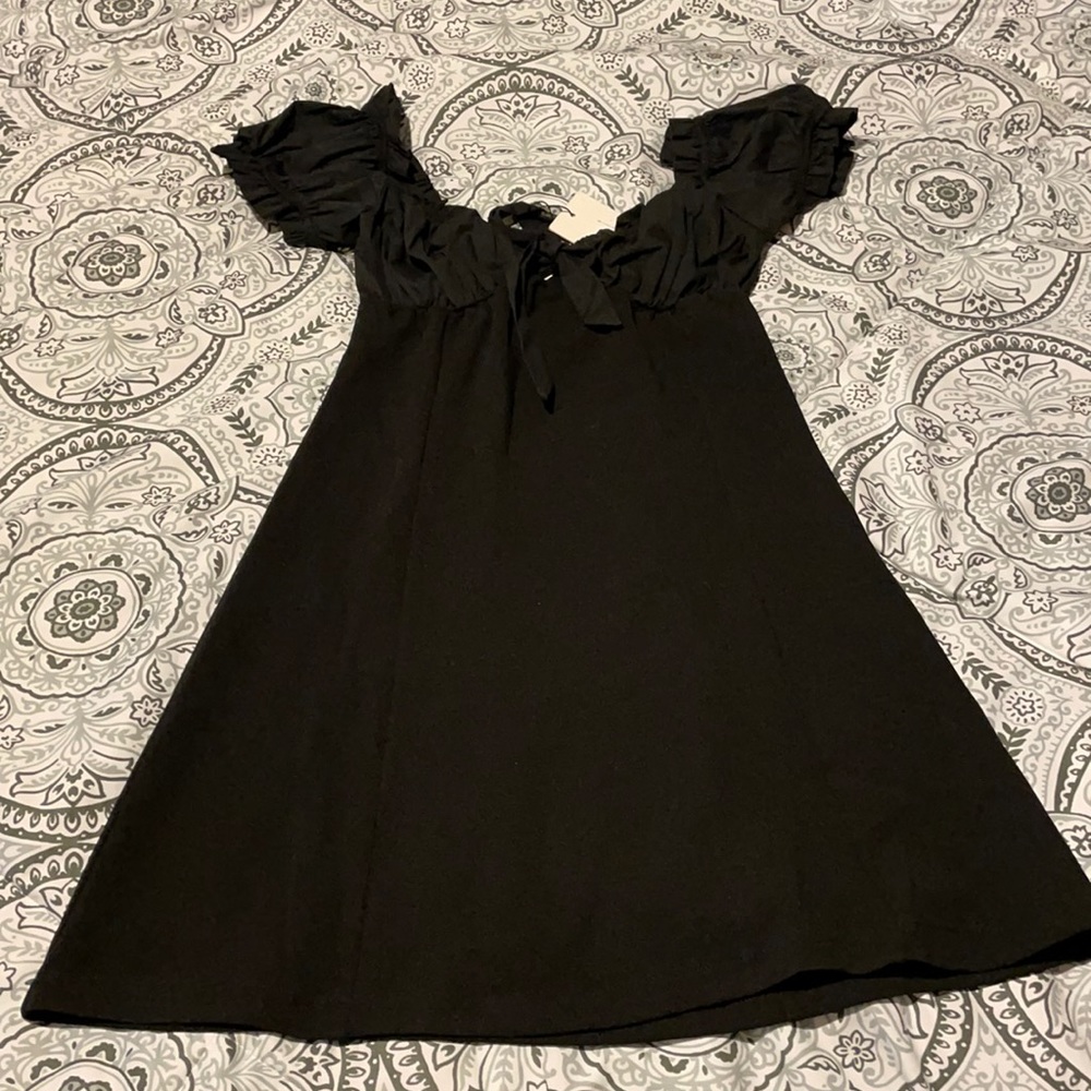 Flamant rose black dress
